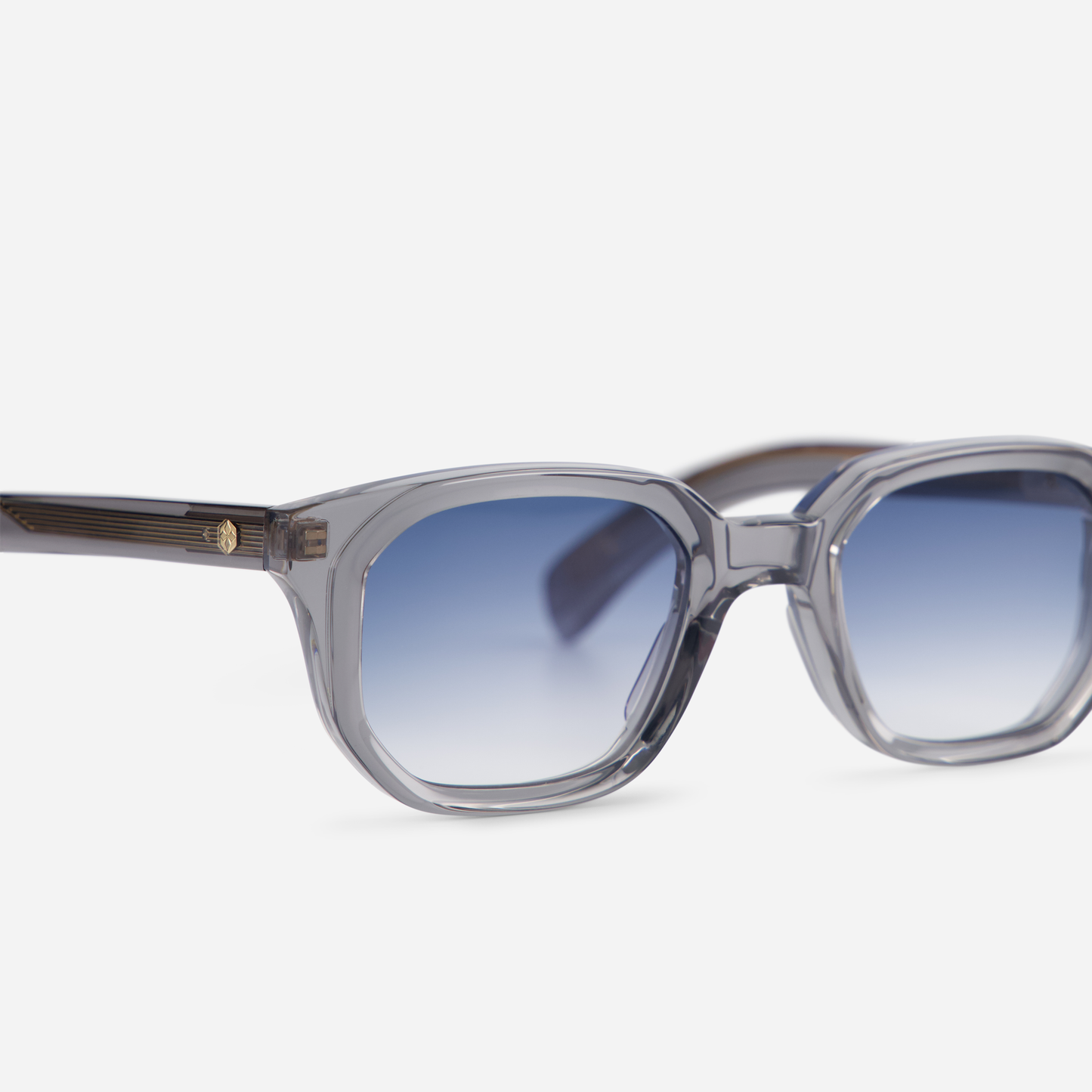 Elevate Your Eyewear Game with Japanese Acetate Frames in Meteor Crystal and Gradient Blue Lenses. The epitome of sophistication.