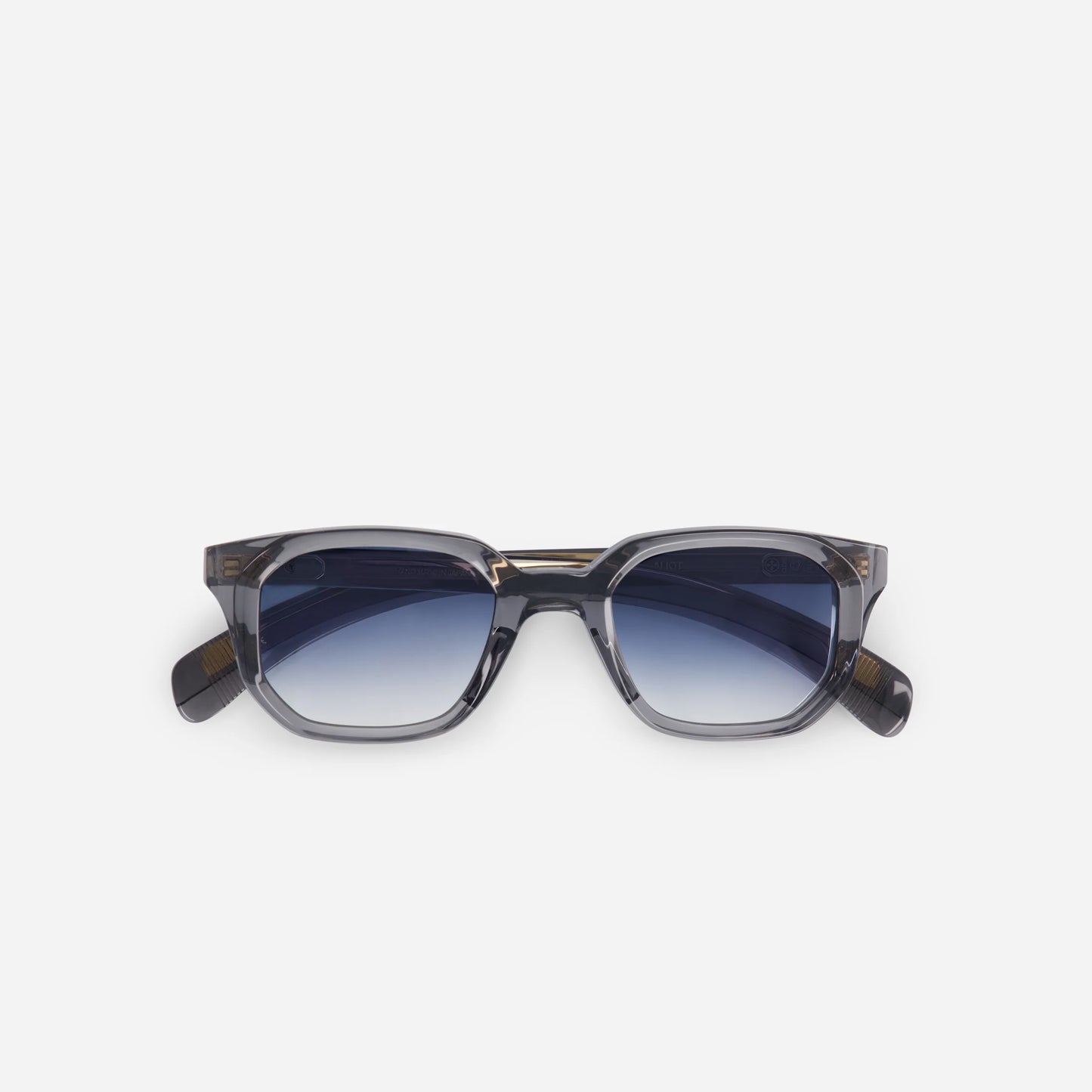 Elevate Your Style with Japanese Acetate Frames. Experience timeless elegance with a Meteor Crystal finish and Gradient Blue lenses.