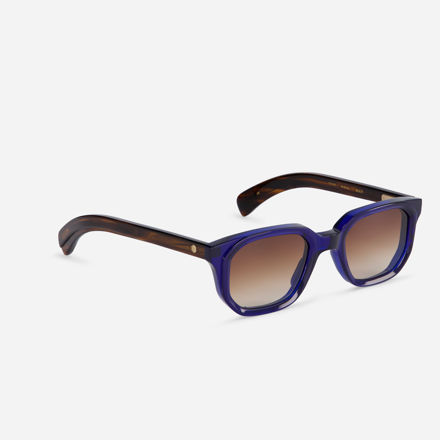 Night Blue Elegance: Experience sophistication with Sato Aliot's midnight blue glasses and beautifully graduated brown lenses.