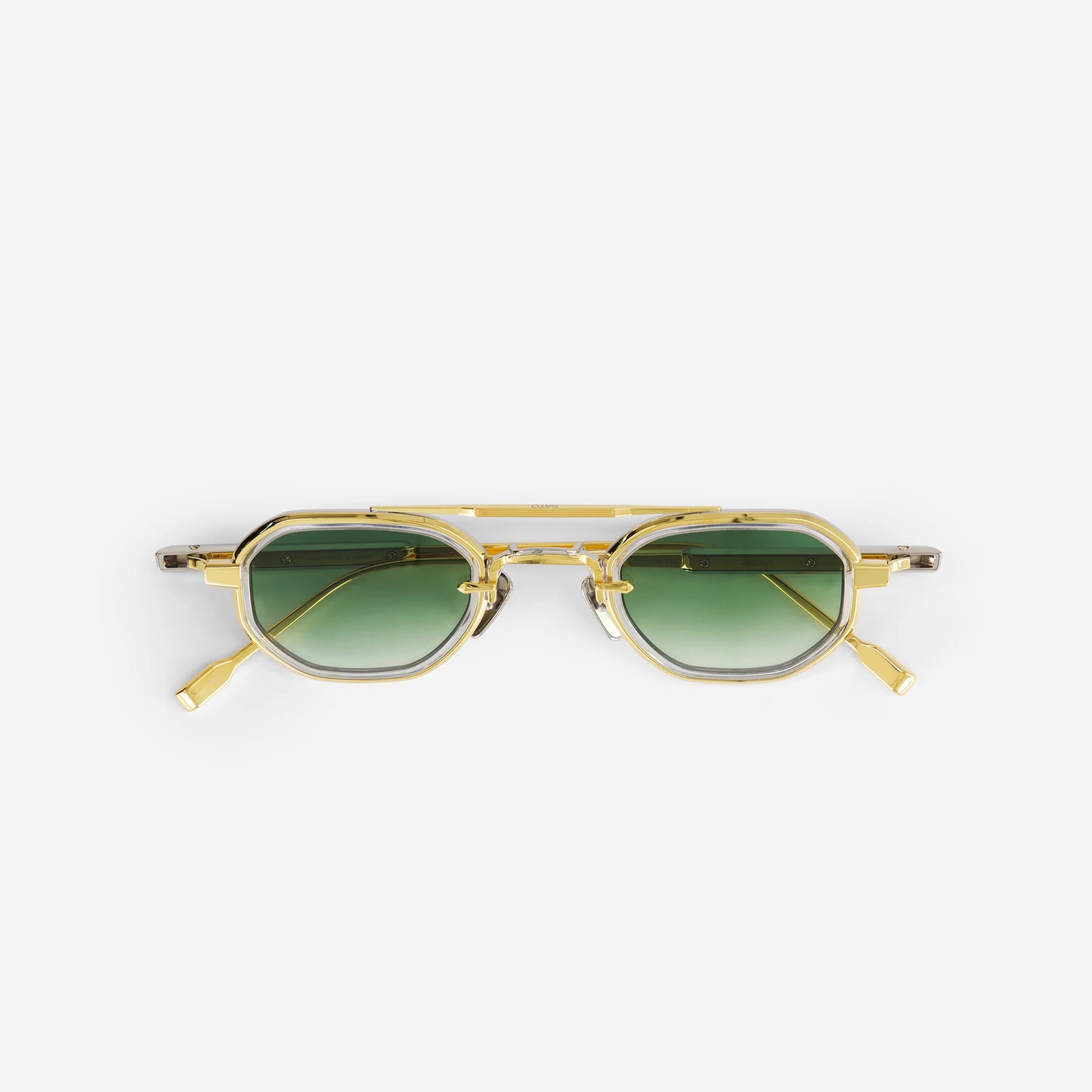 Avior YG/P-1 sunglasses in yellow gold with green gradient lenses. A sleek design for everyday wear.