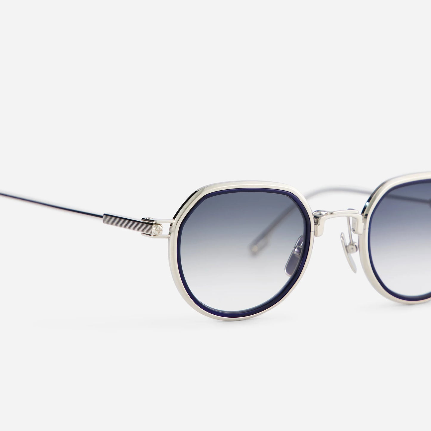 Elevate your look with Belel-T S2201 sunglasses, showcasing sleek gray gradient lenses and a striking blue night insert.