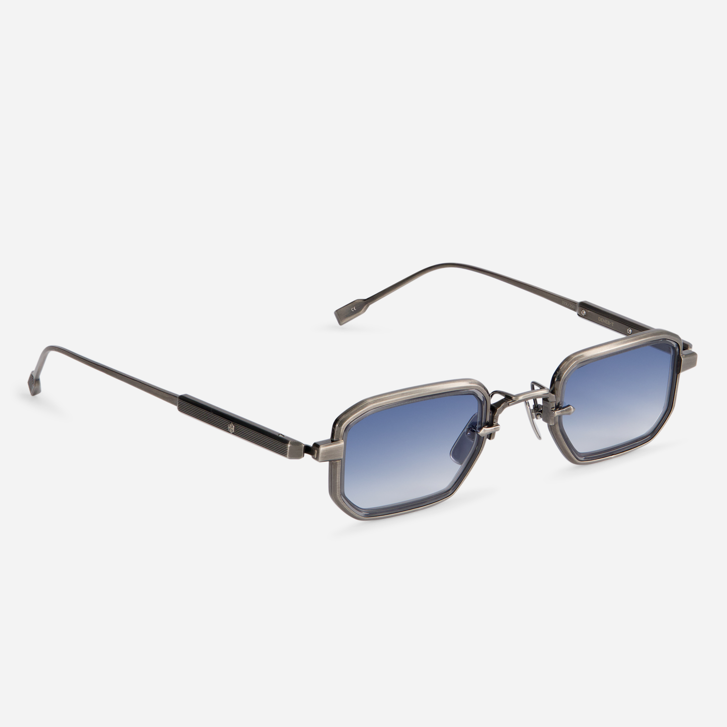 Made in Japan, the Deneb-T AS-1 includes titanium-framed glasses with an antique silver coating and crystal grey rim inserts. The glasses are complemented by gradient blue lenses.