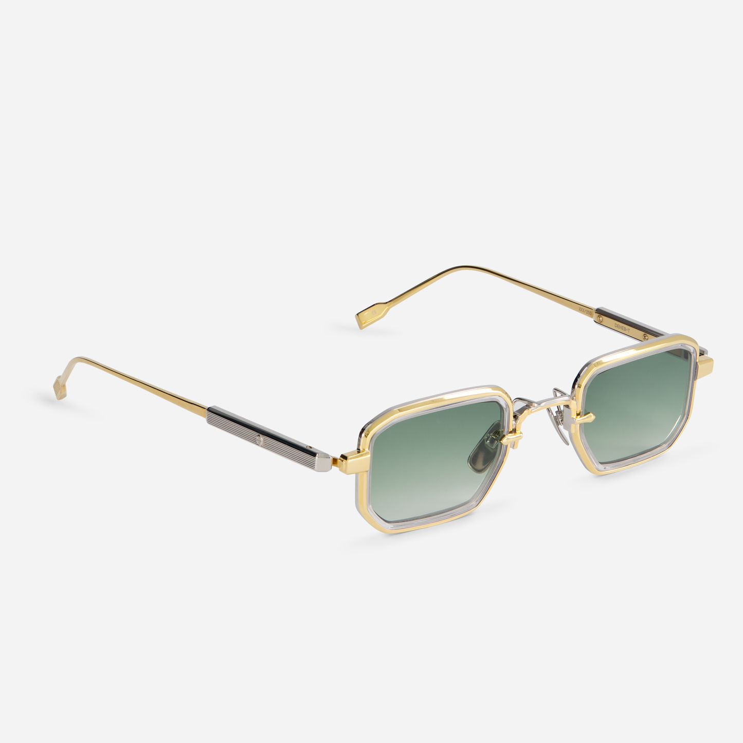 Deneb-T YG/P-1 eyeglasses come with a titanium frame, yellow gold, and platinum coating. They also have a crystal takiron rim insert and gradient green lenses.