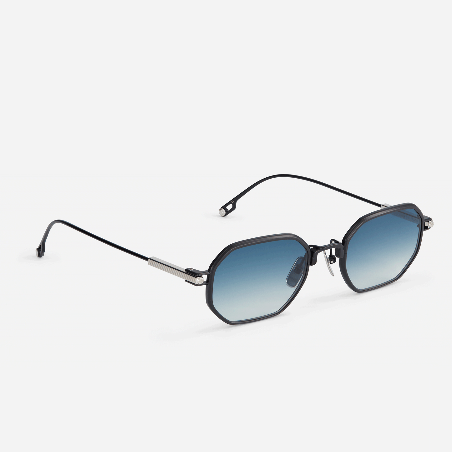 Timir S505 hexagonal glasses. These exquisitely crafted eyewear pieces, made from pure black titanium, feature stunning blue gradient tinted lenses, perfect for both men and women seeking style and sophistication.