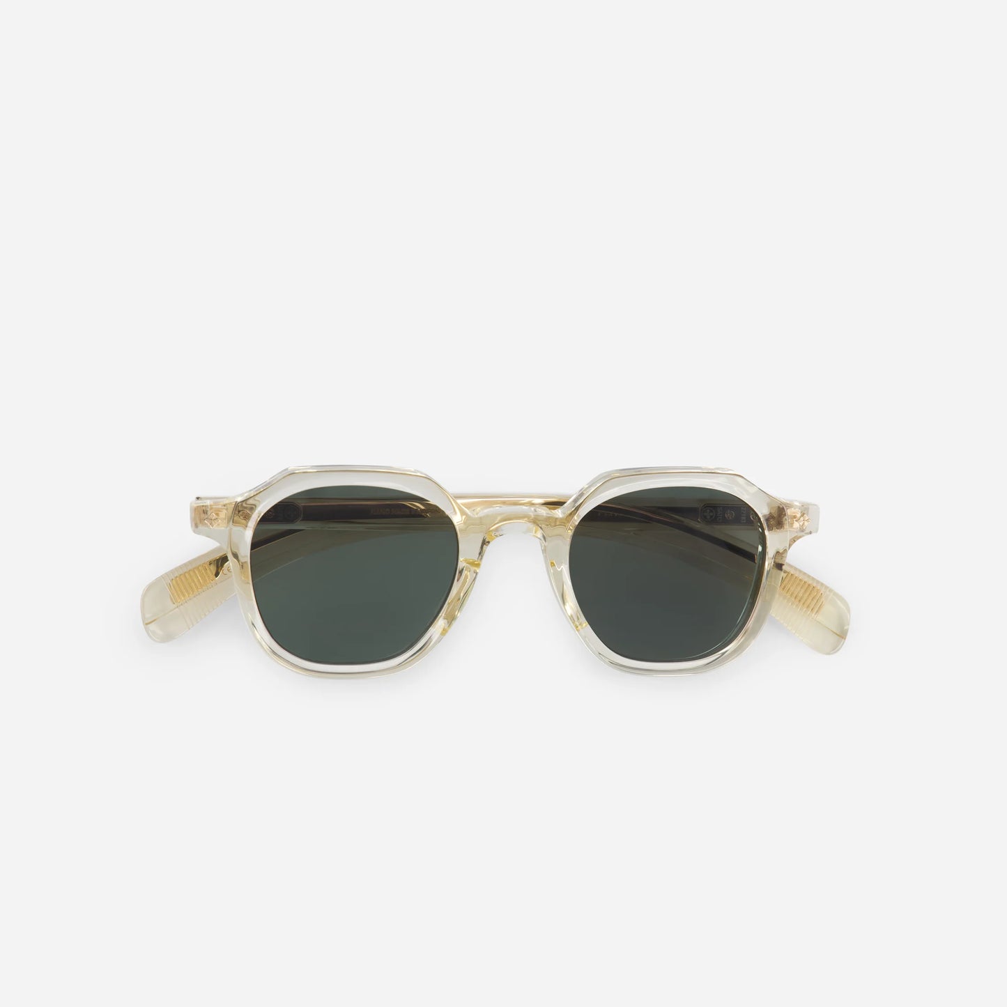 Elevate Your Eyewear Game with the Perse CC-1 5 by Sato: Japanese Acetate Frame, Champagne Crystal Color, and Solid Green Lenses. A fusion of elegance and style.