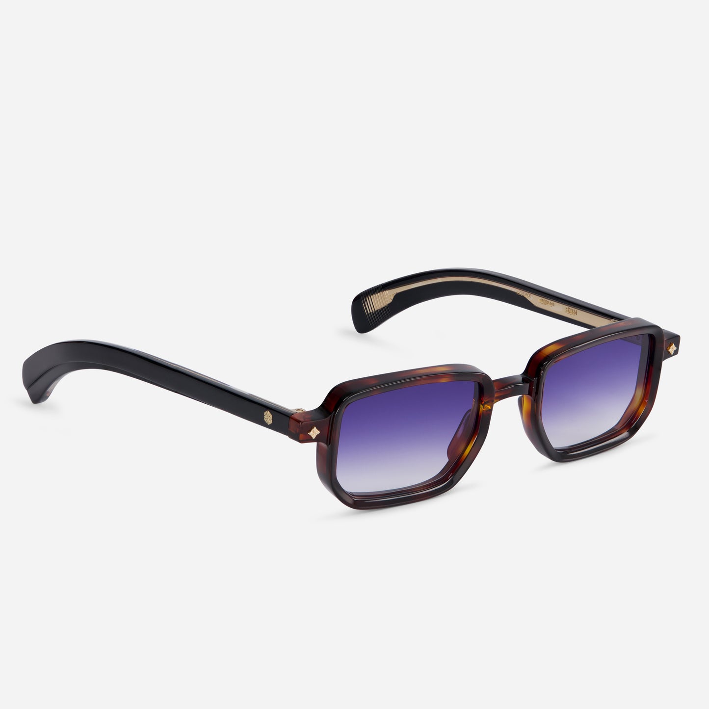 Explore the captivating blend of a Japanese acetate frame in Gambler color, showcasing black arms and a tortoise front, elegantly complemented by gradient new blue lenses in the Ran G-1.