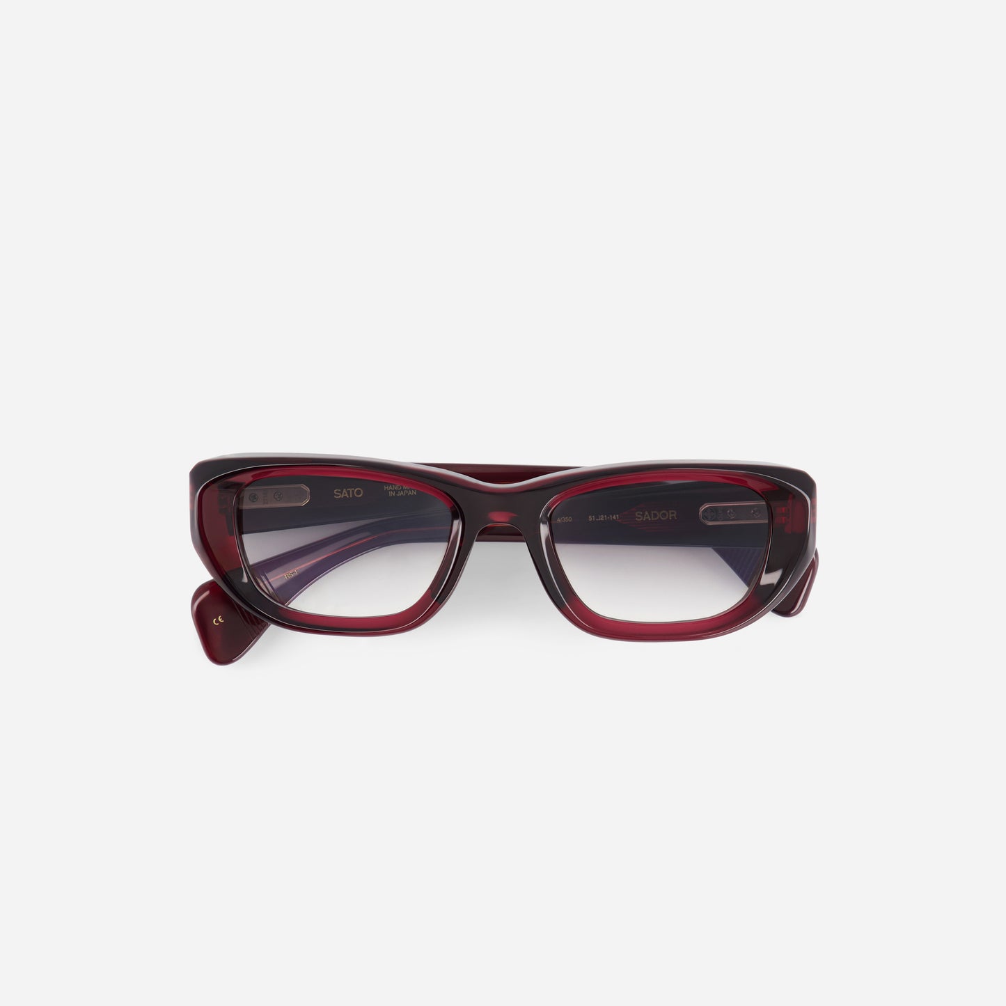 Red-framed eyeglasses on a white background