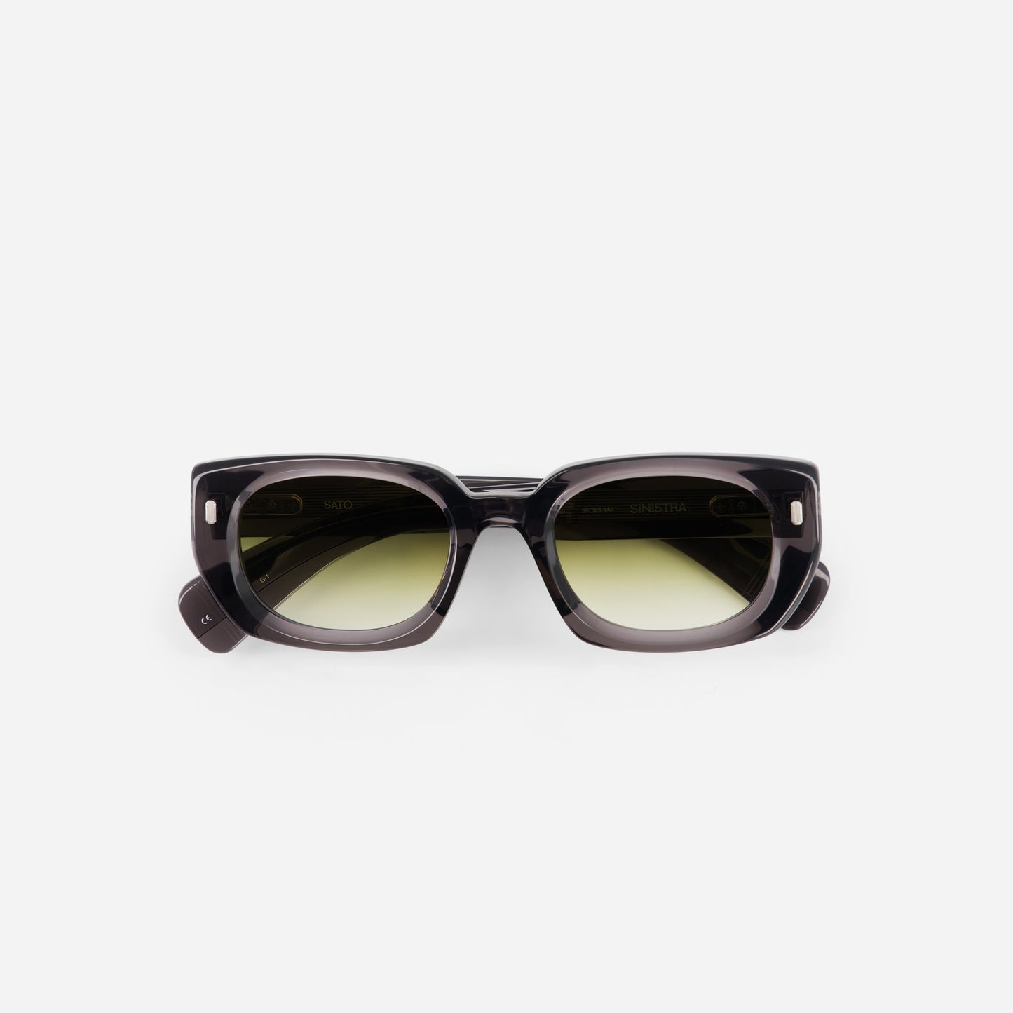 Crystal green sunglasses with dark frames and green-tinted lenses on a white background