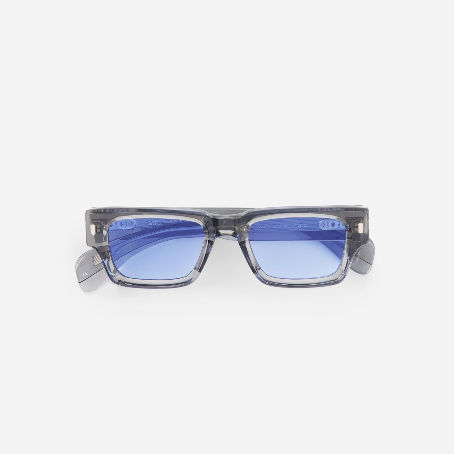 Sunglasses with blue lenses and gray frame on a white background