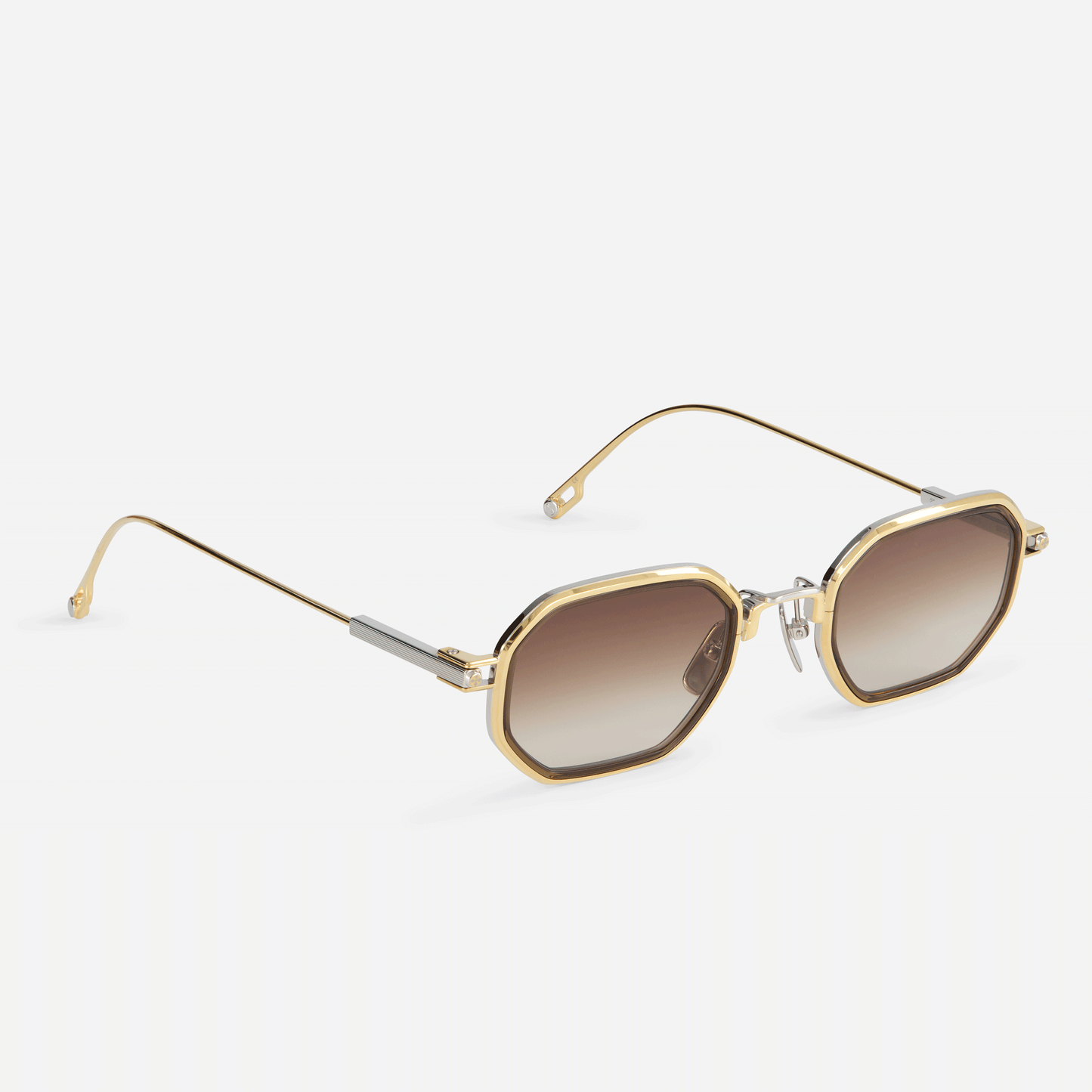 Timir-T S5503 glasses, meticulously crafted from pure titanium in yellow gold and platinum, enhanced by a rich chocolate brown Takiron insert and stunning gradient brown lenses.