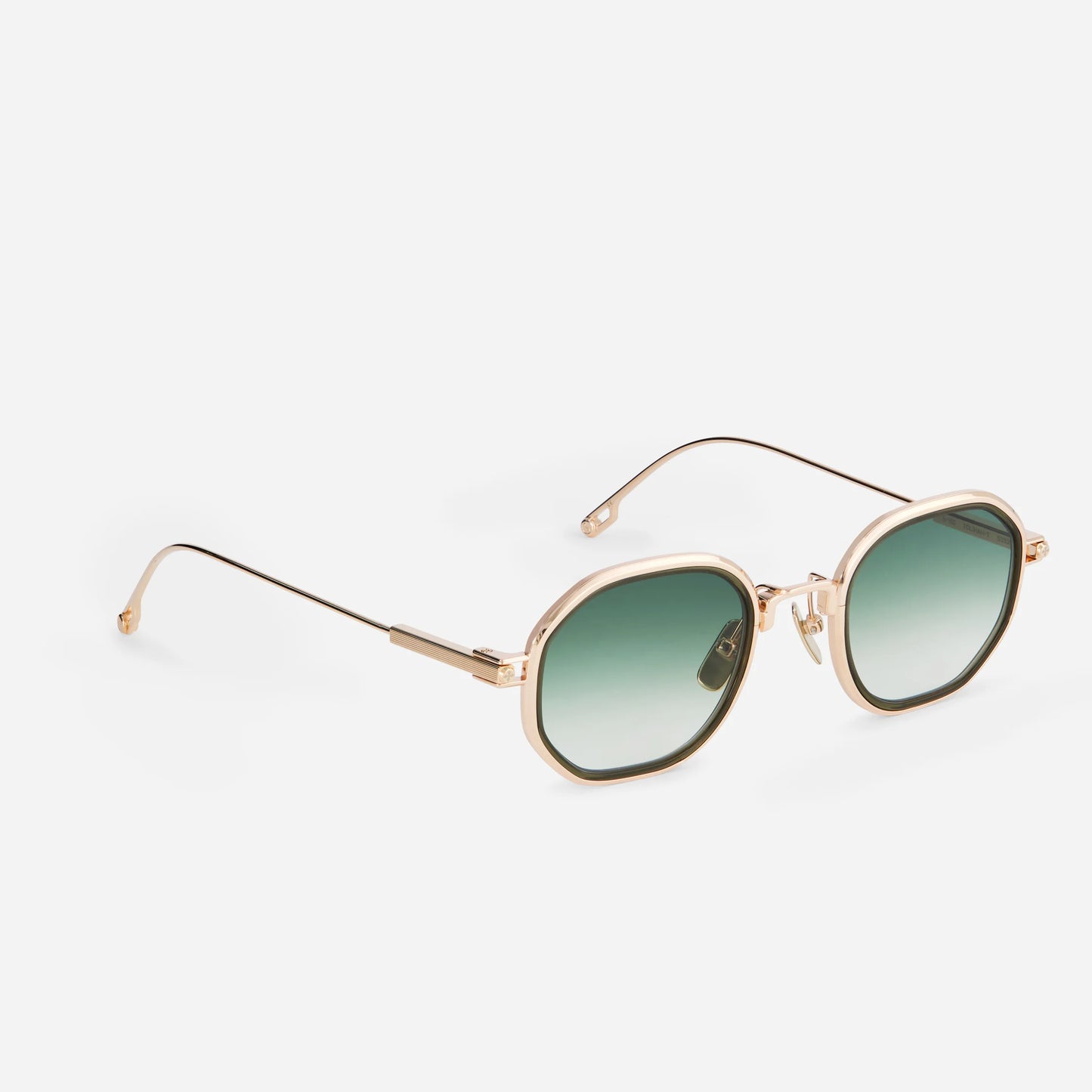 Toliman-T S3309 hexagonal sunglasses. Made from premium rose gold titanium, these eyewear pieces showcase green gradient lenses and a chic olive green insert. SATO