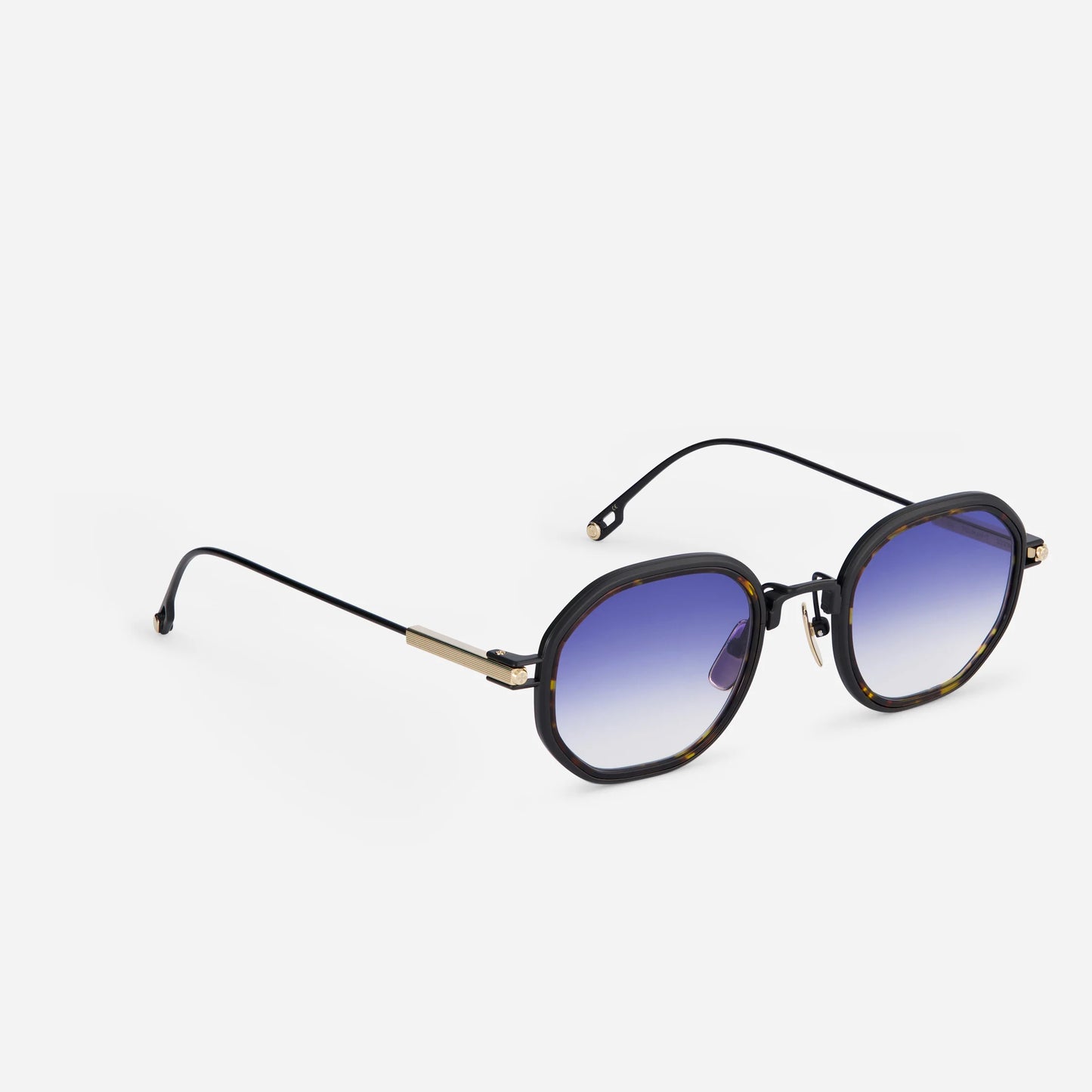 Toliman-T S3306 hexagonal sunglasses. Made from high-quality black titanium, these distinctive eyewear pieces feature dark blue gradient lenses for a sleek look, accentuated by a fashionable tortoise insert.