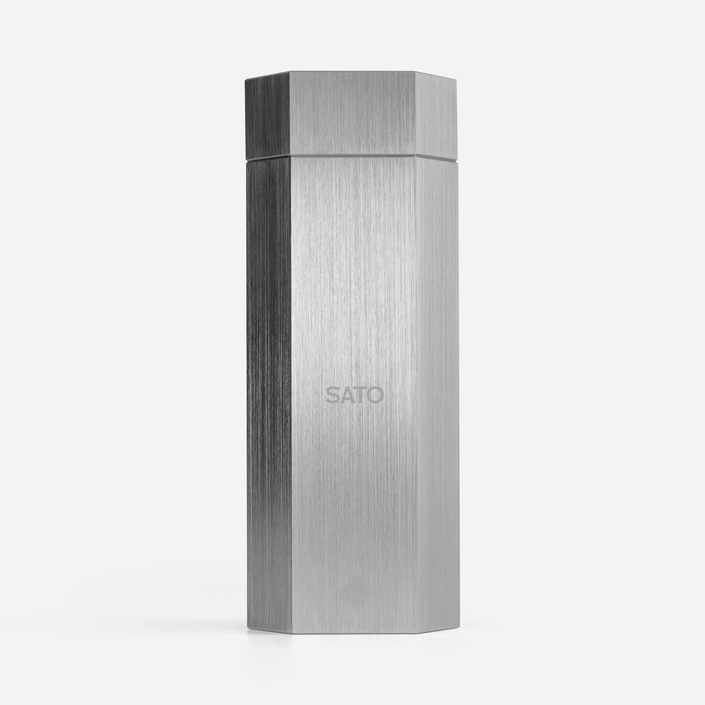 Hexagonal metallic box with 'SATO' branding on a white background