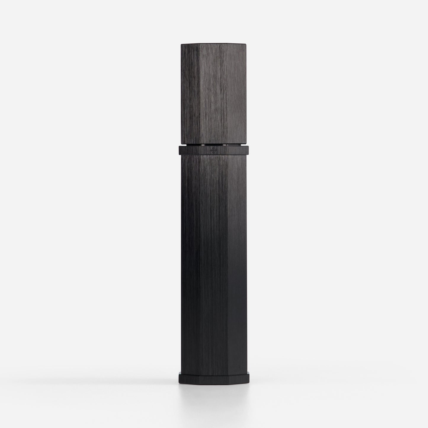 Black cylindrical product on a white background