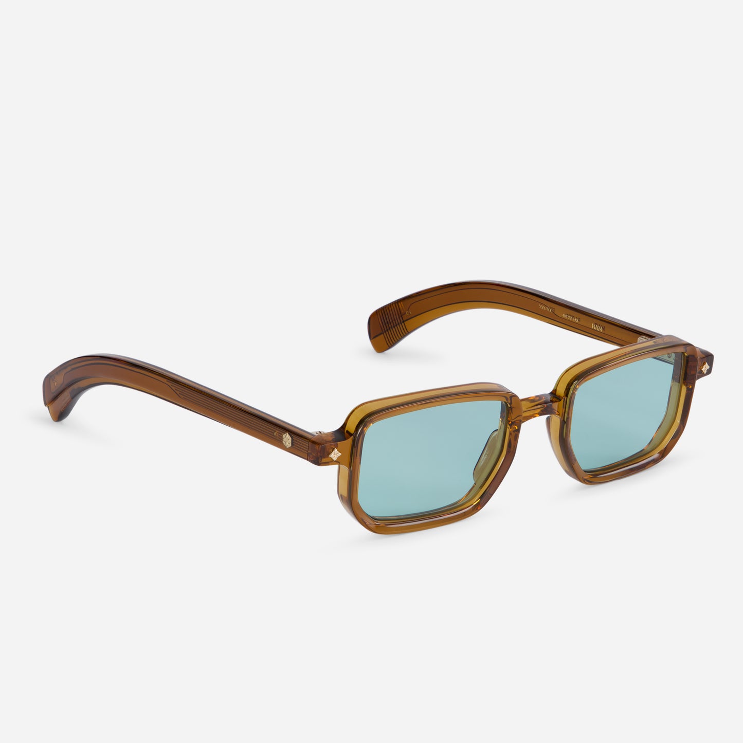 Discover the combination of a Japanese acetate frame in Maple Crystal color (clear brown) with Blue flash lenses in the Ran MC-1. SATO SUNGLASSES
