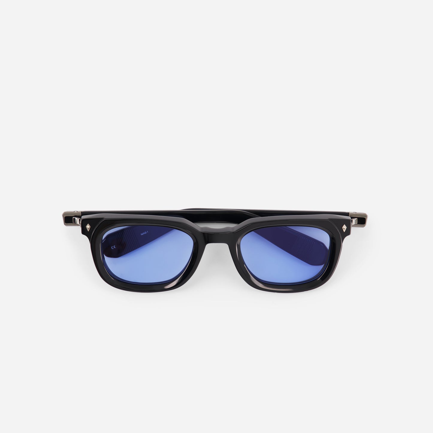 Black sunglasses with blue lenses on a white background