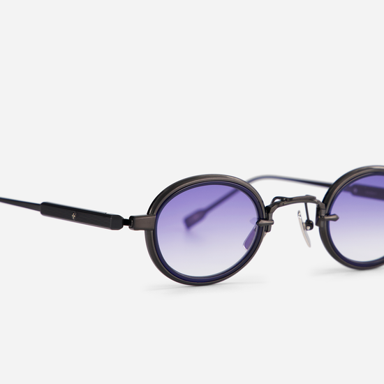 In a close-up side view, the Algedi BB/B-1 emphasizes the vibrant purple gradient lenses, complemented by the midnight blue insert for a unique touch.