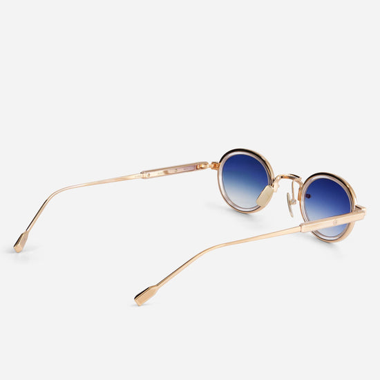 Algedi-T RG-1 sunglasses in rose gold with a crystal insert and blue gradient lenses