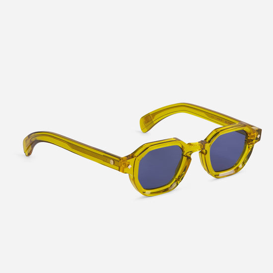 Crafted from yellow crystal, the Almach BL sunglasses with green gradient lenses provide a unique and eye-catching aesthetic.