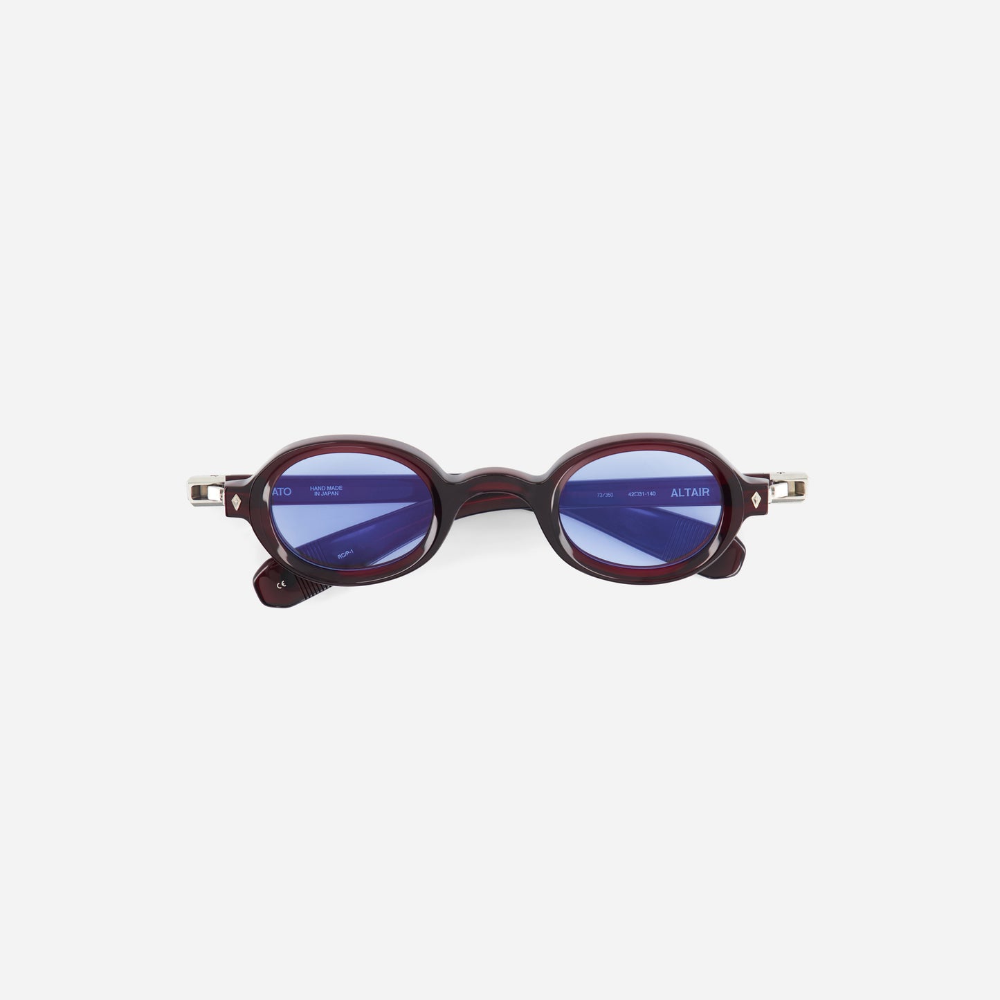 Round sunglasses with a dark red oval frame on a white background