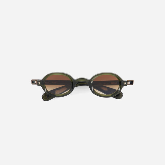 Green oval sunglasses on a white background