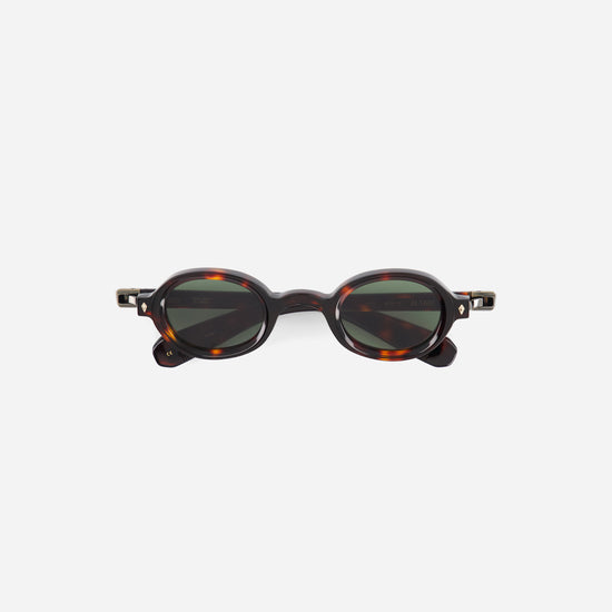 Round oval tortoise sunglasses with dark green lenses 