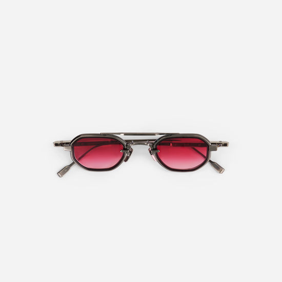 Avior AS/P-1 sunglasses in antique silver and platinum with a burgundy insert.
