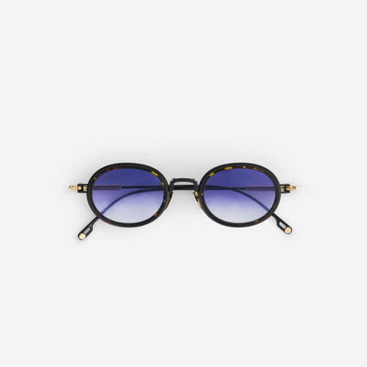 Sato men's sunglasses featuring a black acetate frame and gradient dark blue lenses.