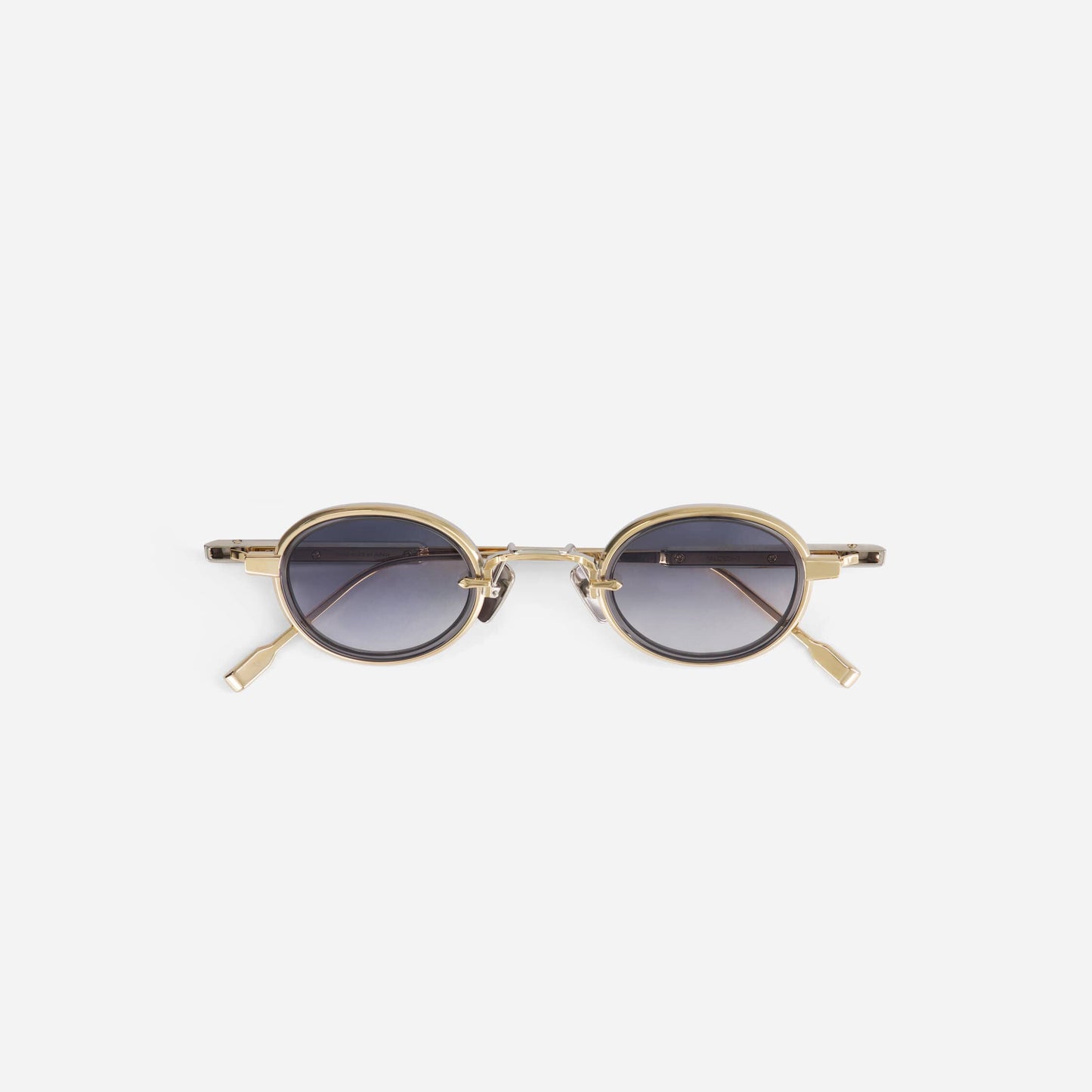 Algedi-T LG/P-1 sunglasses in lunar gold and platinum with a crystal grey insert, crafted and numbered in Fukui, Japan by SATO. A refined and exclusive design.