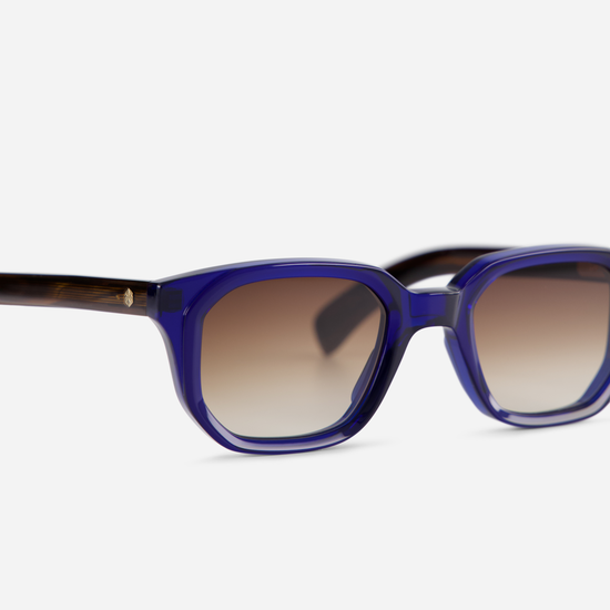 Aliot by Sato: Unleash your inner fashionista with these striking midnight blue frames and gradient brown lenses.