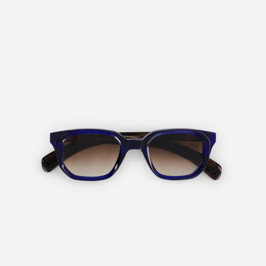 Sato Aliot Midnight Blue Glasses: Elevate your style with these stunning night blue frames and gradient brown lenses.