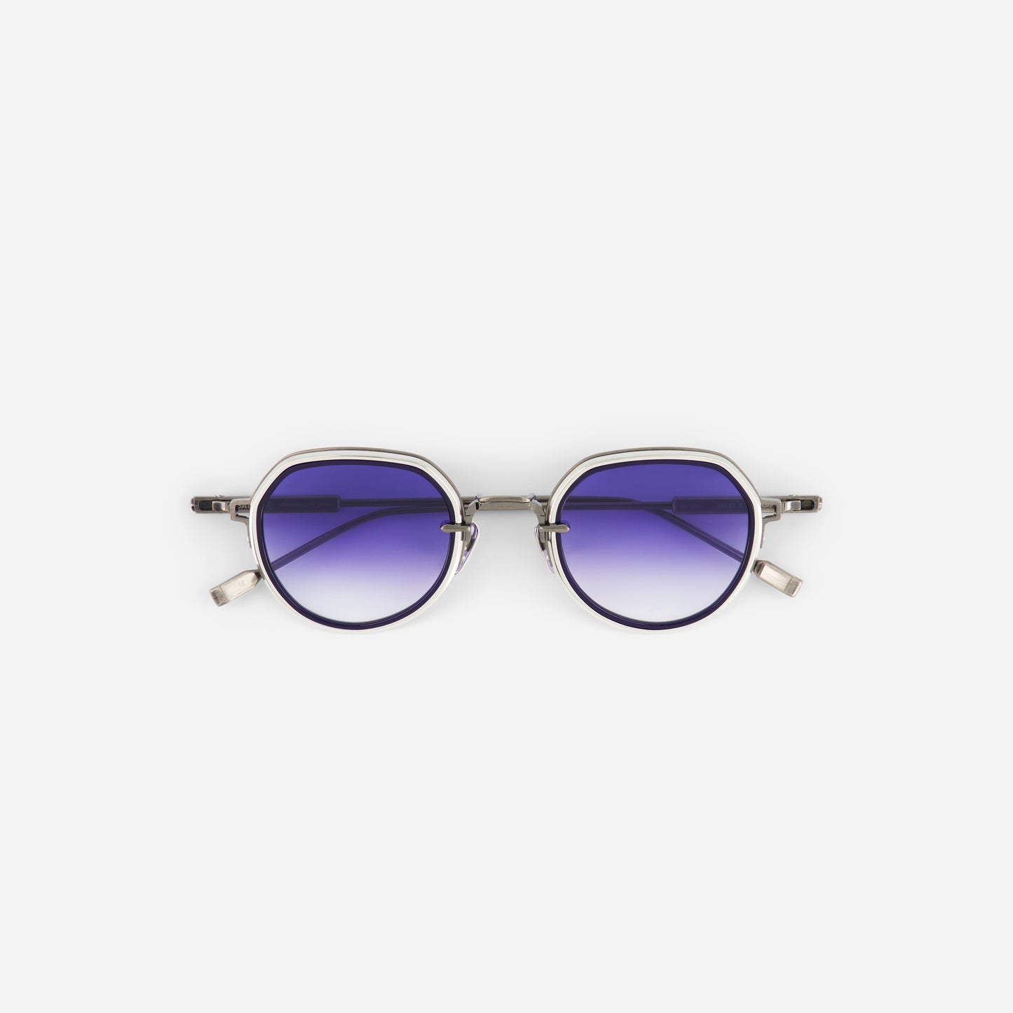 Round sunglasses with purple gradient lenses on a white background