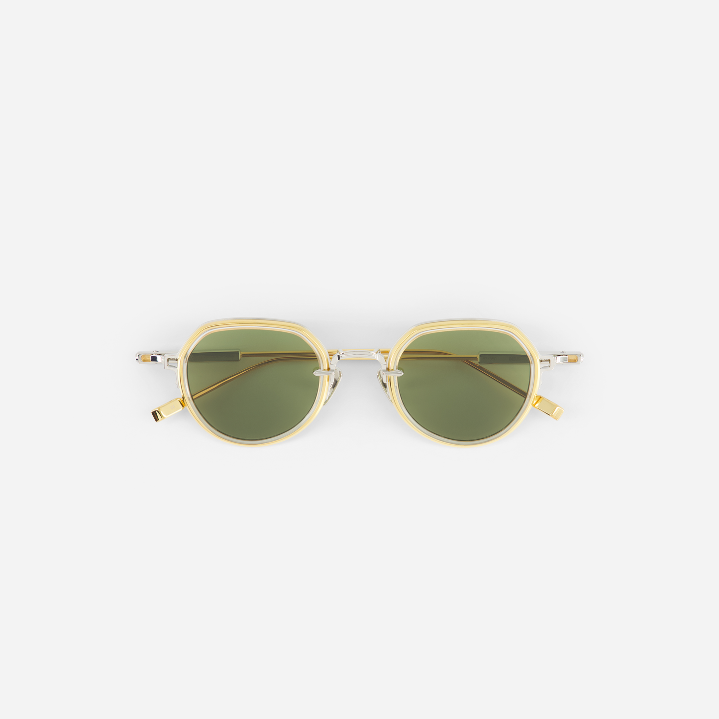 Yellow gold sunglasses with green lenses on a white background