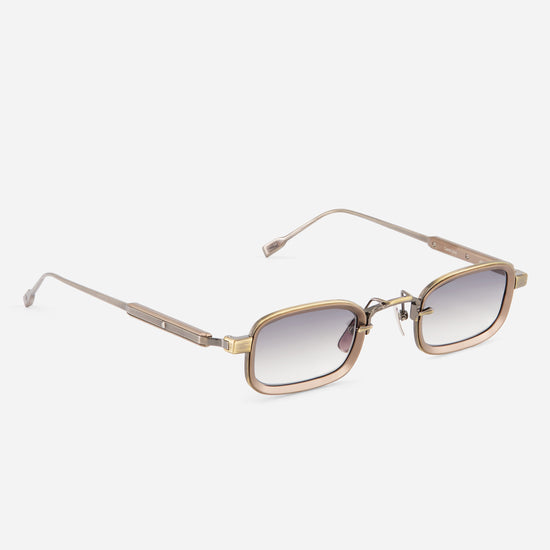 Gold-framed sunglasses with gradient lenses on a white background