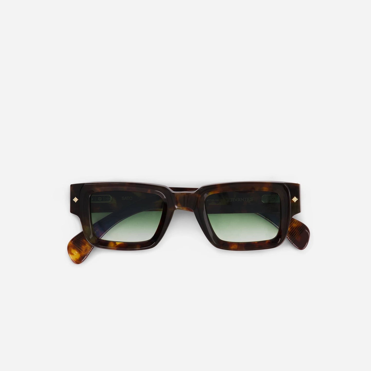 Cervantes MT-1 sunglasses in marble tortoise feature a stylish blend of rich patterns and crystal accents for a sophisticated look.