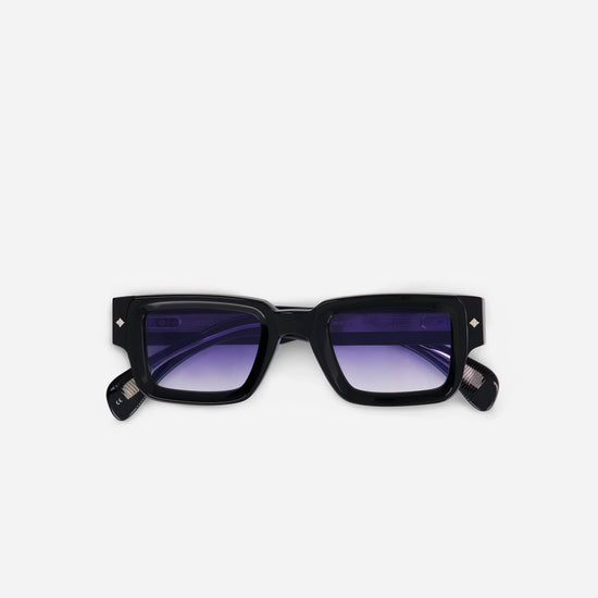 Cervantes N-1 sunglasses in black feature a sleek, contemporary frame design paired with stylish blue gradient lenses.