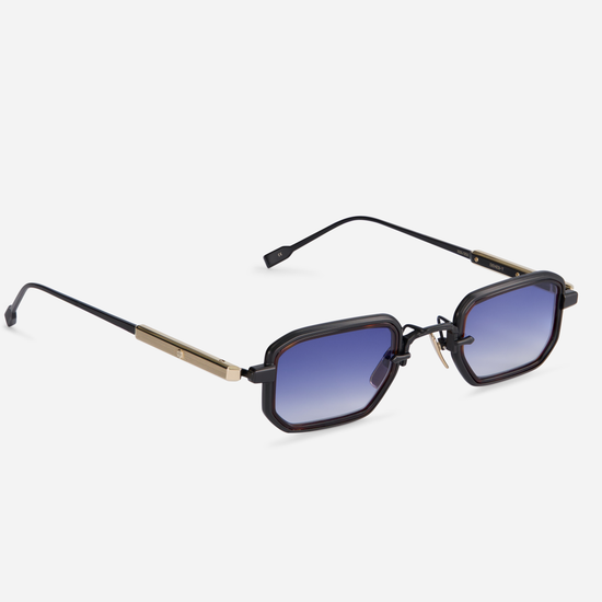 With a titanium frame combining black mat and lunar gold coatings, the Deneb-T B/LG-1 eyewear incorporates a tortoise takiron rim insert and gradient dark blue lenses.