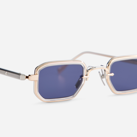 Deneb-T RG/P-1, made in Japan, showcases titanium-framed glasses with rose gold and platinum coatings. They are complemented by crystal takiron rim inserts.