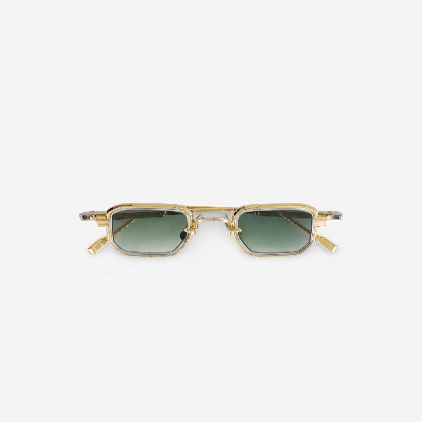 The Deneb-T YG/P-1 has a titanium frame with yellow gold and platinum coatings. It's designed with a crystal takiron rim insert and features gradient green lenses.
