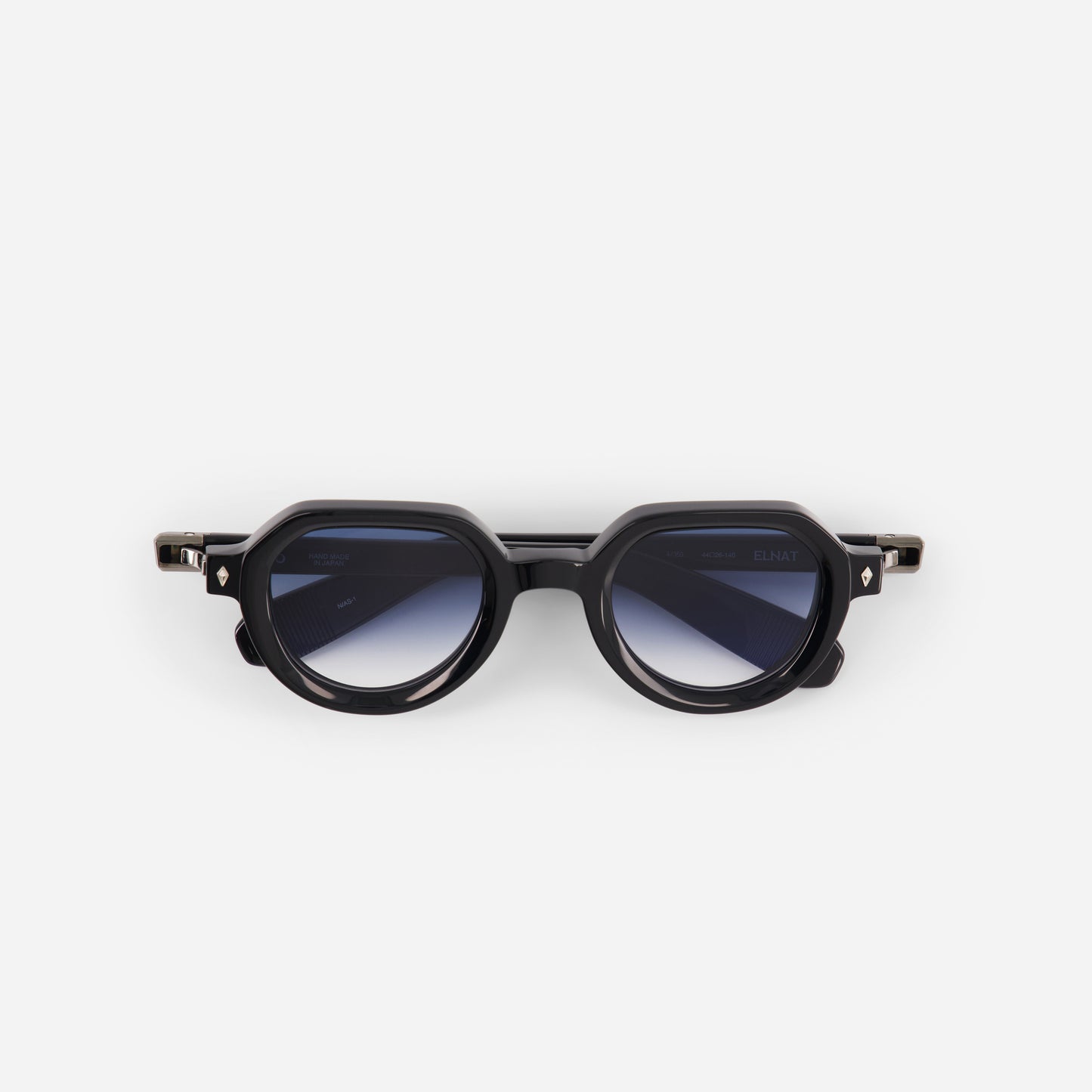 Black sunglasses with gradient blue lenses and antique silver coating on a white background