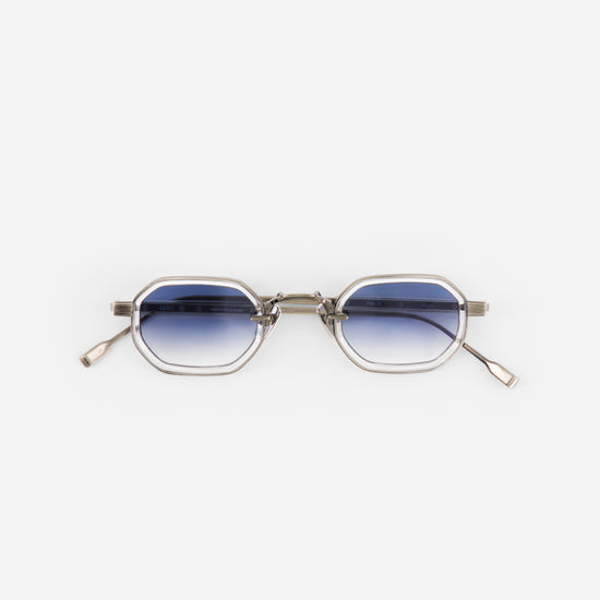 Sunglasses with gradient lenses on a white background