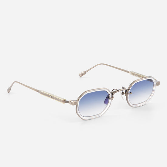 Sunglasses with gradient blue lenses and thin metal frame on a white background