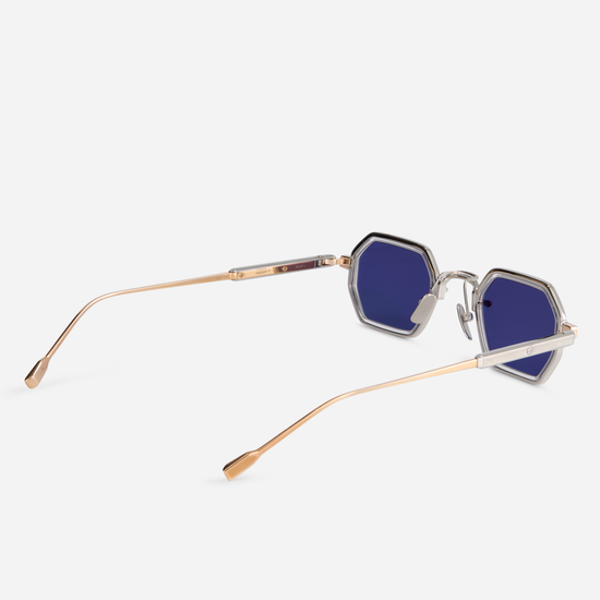 Manufactured in Japan, the Hadar-T RG/P-1 glasses offer a titanium frame with rose gold and platinum coatings. Crystal takiron rim inserts add a touch of elegance to the eyewear, which is paired with BL-16 blue lenses.