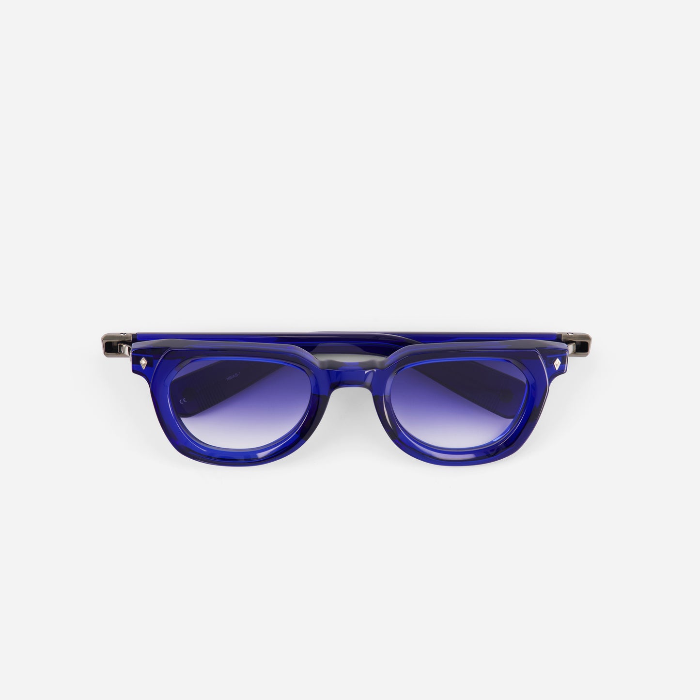Blue sunglasses with gradient lenses on a white background