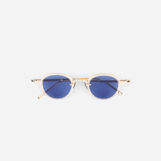 round rose gold sunglasses with BL16 blue lenses on a white background