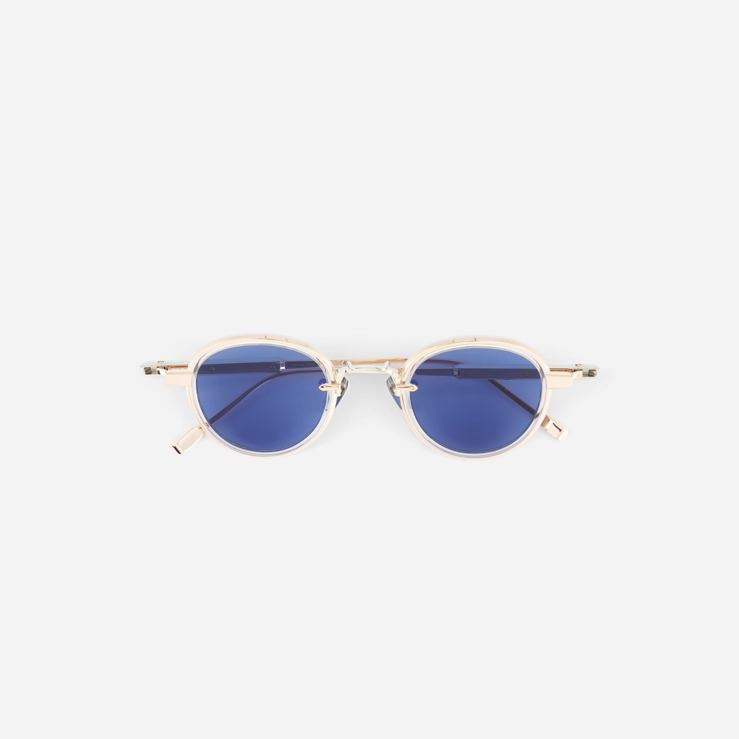 round rose gold sunglasses with BL16 blue lenses on a white background