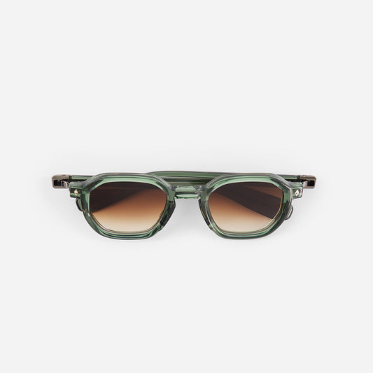 Green sunglasses with gradient lenses on a white background