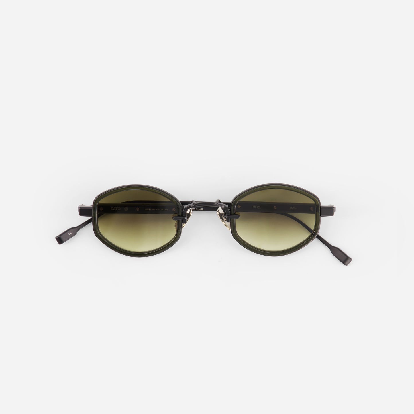 Round sunglasses with gradient lenses on a white background