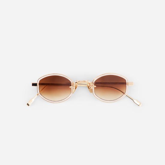 Rose gold sunglasses with gradient brown lenses 