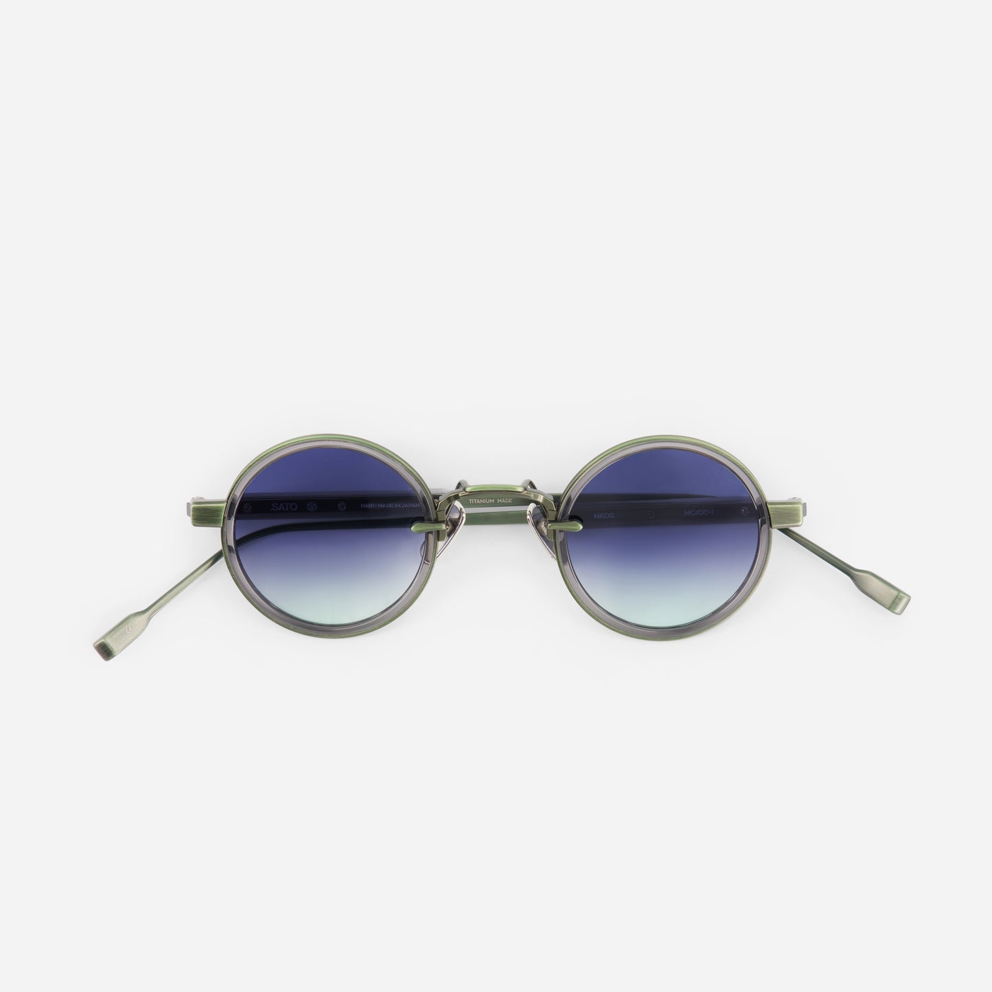 Round sunglasses with gradient blue lenses on a white background